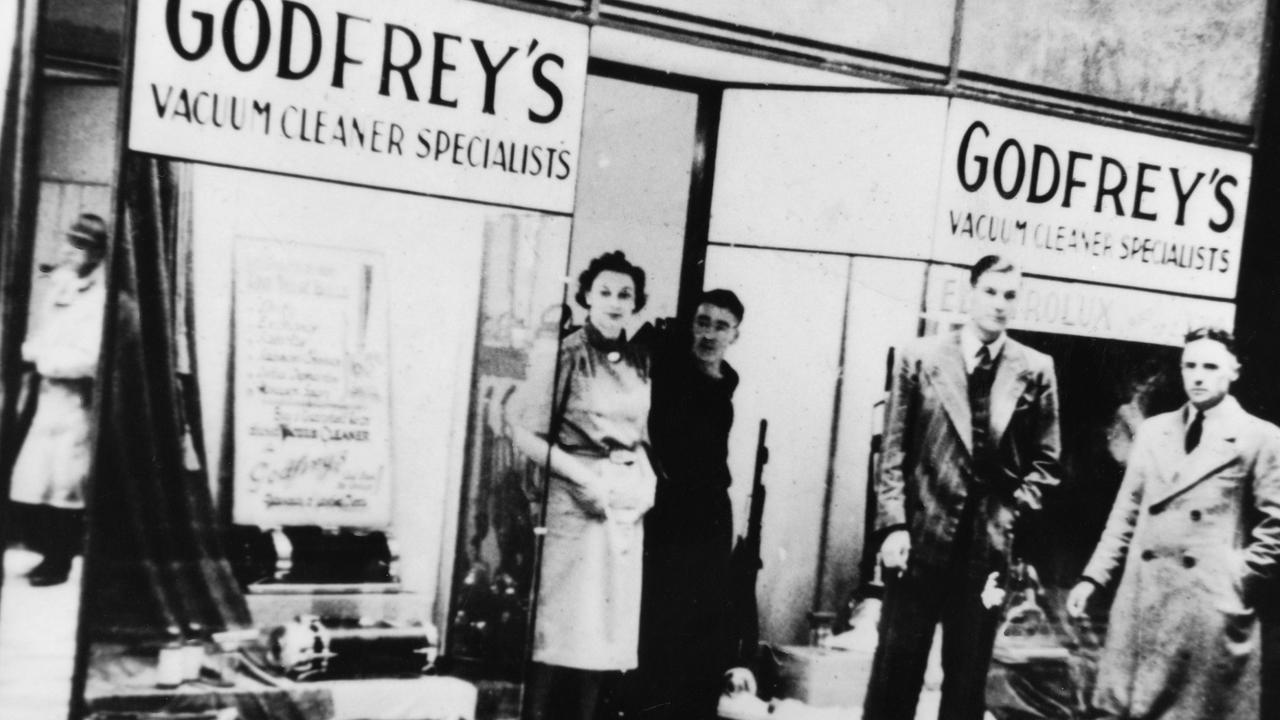 John Johnston and others outside Godfreys original Adelaide Arcade store. Picture: Supplied