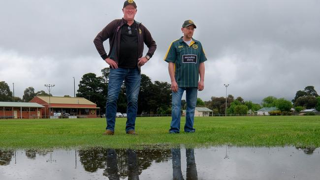 Meredith Cricket Club copped 60mm of rain over night. Pictured are Terry Hart and Damian Brunt. Picture: Mark Wilson