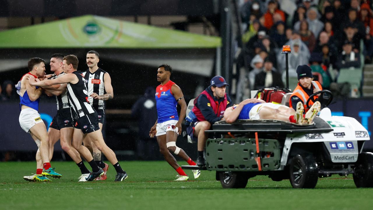 Brayden Maynard tustles with Jack Viney as Andrew Brayshaw gets stretchered away. Picture: Getty Images