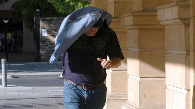 Goros outside the District Court in 2005, prior to his sentencing for attempted frauds worth $8.5 million.