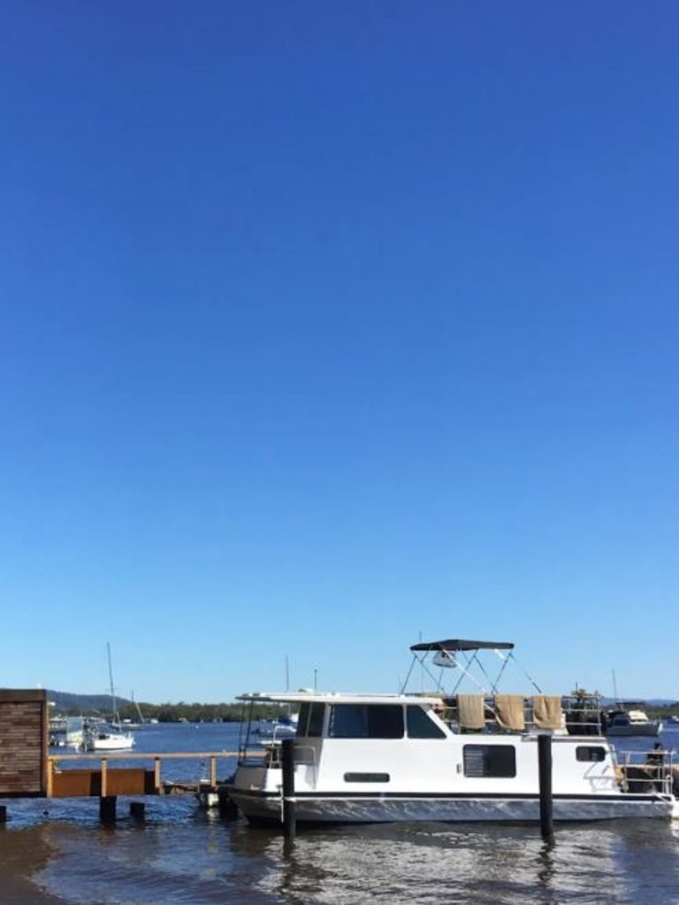 The new owners of this Noosa River jetty and houseboat will enjoy waking up on the waterfront to the remarkable sunrises. Picture: AirBNB.