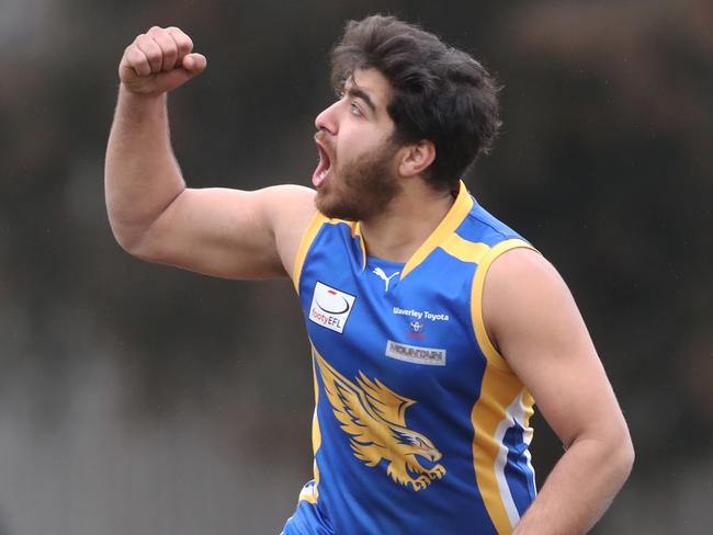 Adam Amin slots through a goal. Picture: David Crosling