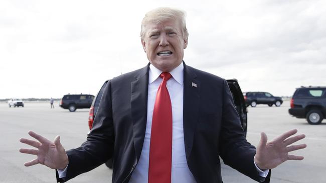 President Donald Trump boards Air Force One, Sunday, March 24, 2019, at Palm Beach International Airport, in West Palm Beach, Fla., en route to Washington. (AP Photo/Carolyn Kaster)