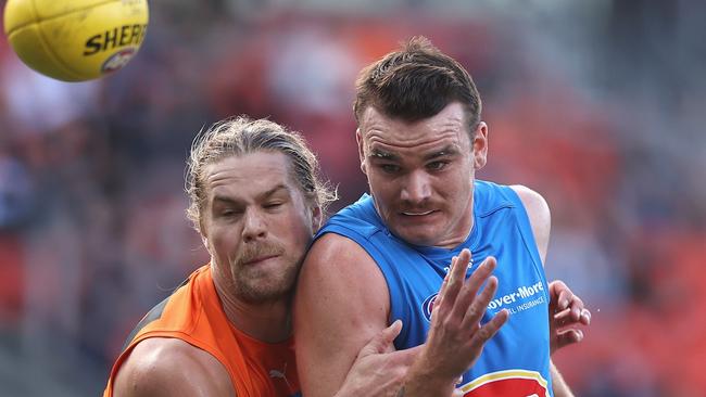 SYDNEY, AUSTRALIA - APRIL 02: HarryÃÂ Himmelberg of the Giants and Caleb Graham of the Suns contest the ball during the round three AFL match between the Greater Western Sydney Giants and the Gold Coast Suns at GIANTS Stadium on April 02, 2022 in Sydney, Australia. (Photo by Cameron Spencer/Getty Images)