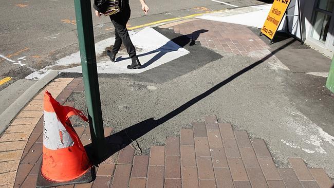 The dodgy footpath outside 507 Military Rd, Mosman has not been fixed since a new building was constructed late last year. Picture: Virginia Young