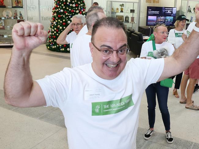 Arundel residents outside Gold Coast City Council Chambers celebrating after a special meeting of Councillors today voted to scrap Arundel golf club plans. Organiser Jason Young happy with the decision. Picture Glenn Hampson