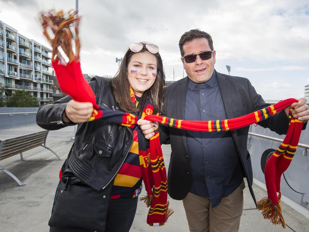 Crows fans start flocking to the MCG. Father and daughter, Katherine and Tino Picariello. Picture: Sarah Matray