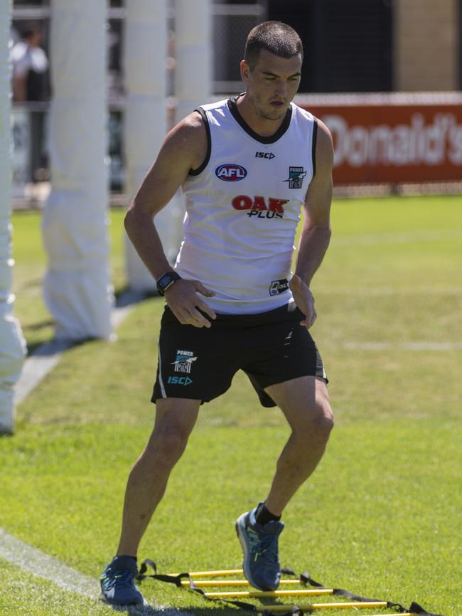 Key recruit, Tom Rockliff in action during Port Adelaide pre-season training at Alberton Oval.