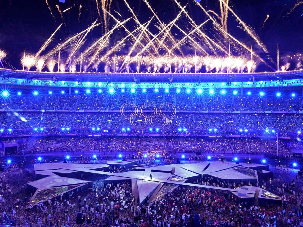 Fireworks sparkle in the sky at the end of the closing ceremony of the Paris 2024 Olympic Games at the Stade de France, in Saint-Denis, in the outskirts of Paris, on August 11, 2024. (Photo by Dimitar DILKOFF / AFP)