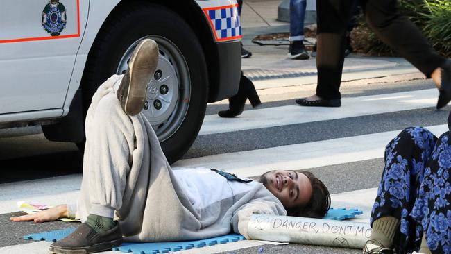 A Brisbane court heard it took three hours to unglue Eric Serge Herbert from the road in Post Office Square. Picture: Liam Kidston.