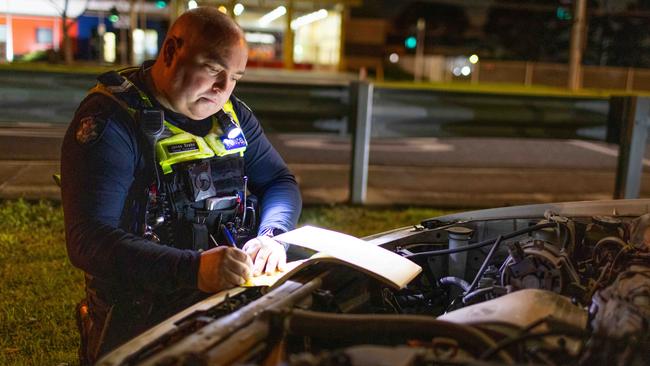 A check under the bonnett is conducted. Picture: Mark Stewart