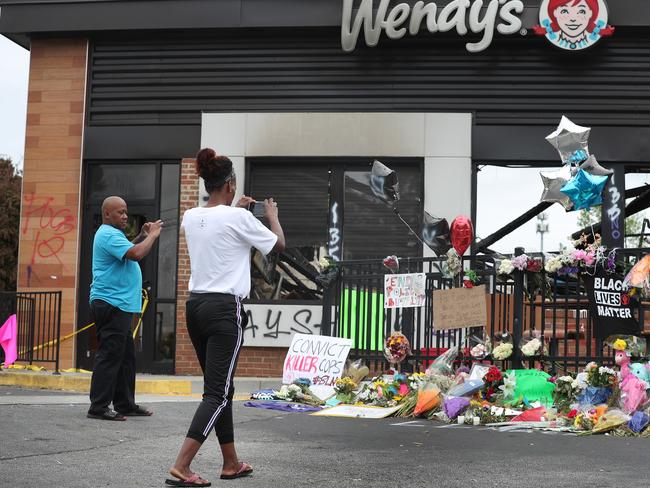 A memorial outside the Wendy's restaurant that was set on fire by demonstrators after Rayshard Brooks was killed in Atlanta, Georgia. Picture: AFP