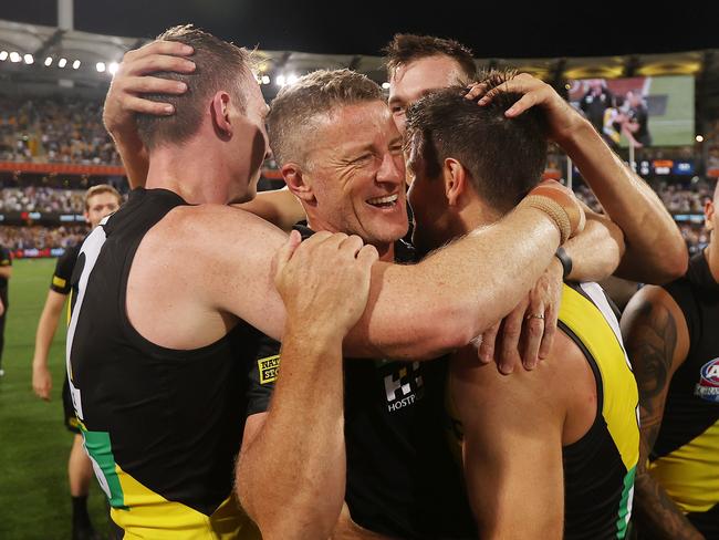 2020 AFL Grand Final match between the. Richmond Tigers and the Geelong Cats at the Gabba on October 24, 2020 in Brisbane, Australia.   Damien Hardwick, Senior Coach of the Tigers gets a hug after game     Picture : Michael Klein