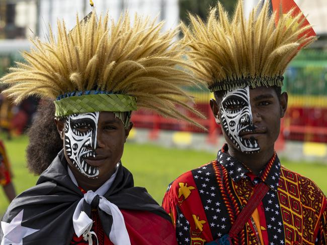 Papua New Guinean locals celebrate the 49th Independence Day at King Charles Oval at Wewak, Papua New Guinea. PHOTO: LCPL Riley Blennerhassett