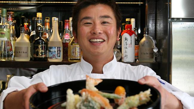 Ten Japanese restaurant chef Daisuke Miyake with his dish scampi and vegetable tempura.