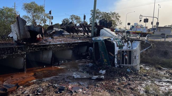 A man in his 60s has been rescued after his B-double truck rolled over on the outskirts of Bundaberg. Picture: Nicole Strathdee