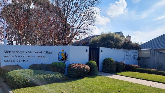 The words 'Jew die' graffitied on the front fence of Mount Scopus' Burwood Campus on May 25, 2024. Picture: Carly Douglas.