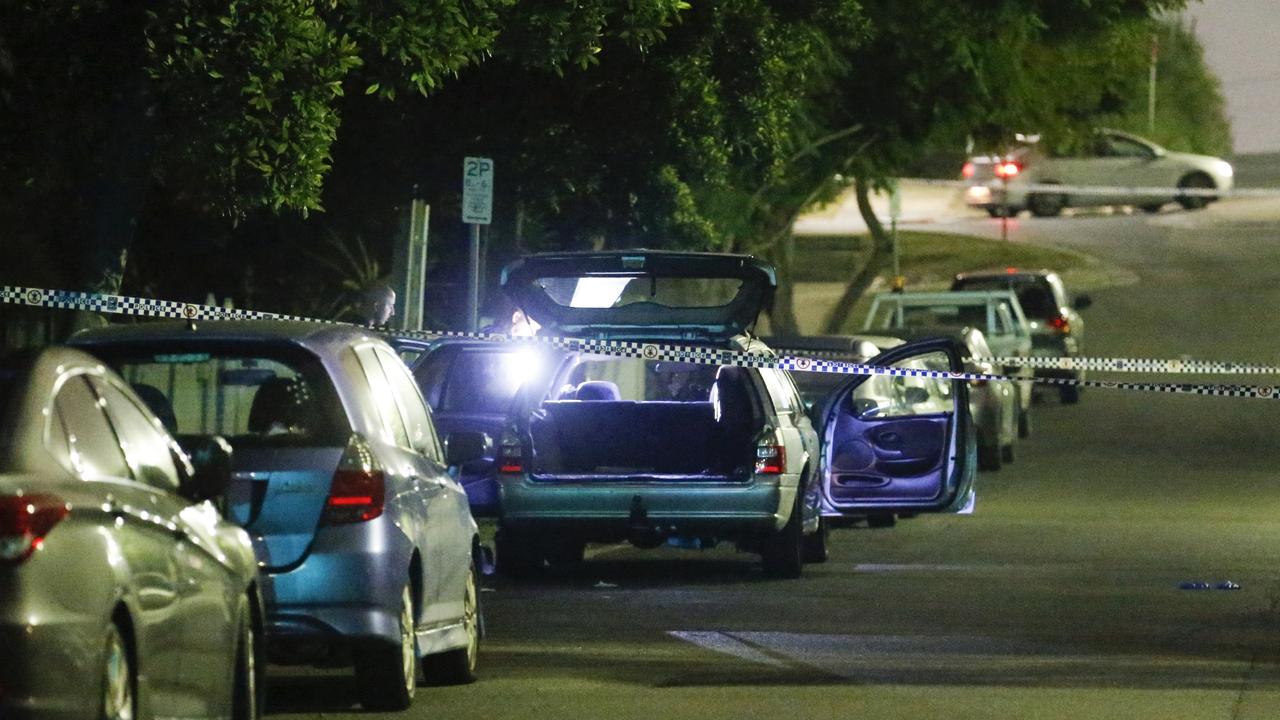 Police searched a station wagon nearby where a man was arrested following the alleged stabbing. Picture: Steve Tyson