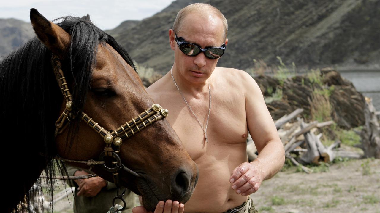 Some people like to go on beach holidays. Putin goes bare-chested into the Siberian wilderness. Picture: AFP
