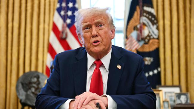 US President Donald Trump speaks to the press as he signs an executive order to create a US sovereign wealth fund, in the Oval Office in the White House. Picture: Jim Watson/AFP