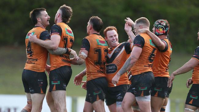 Tigers celebrate win in Denton Engineering Cup round two. Wyong Roos vs The Entrance Tigers at Morry Breen Oval, 20 April 2024 pic Sue Graham