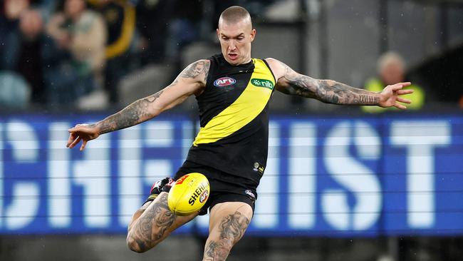 MELBOURNE, AUSTRALIA – JUNE 17: Dustin Martin of the Tigers kicks the ball during the 2023 AFL Round 14 match between the Richmond Tigers and the St Kilda Saints at the Melbourne Cricket Ground on June 17, 2023 in Melbourne, Australia. (Photo by Michael Willson/AFL Photos via Getty Images)