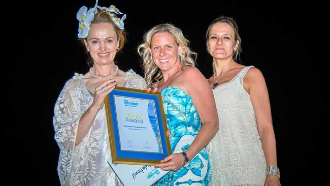 HOSTS: Elizabeth Hackett, Tara Tissington and Louise Bomitali accept Magnums' Backpacker Accommodation award. Picture: Island Photos Pty Ltd/Tourism Wh