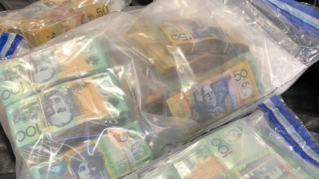 Half a million dollars of cash seized by police in the western suburbs drug sting. Picture: SA Police