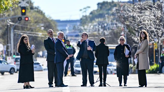 Judge Nick Alexandrides (second from left), defence lawyer Paul Rice KC (third from left), prosecutor Michael Foundas (centre) along with court staff at a court view of Goodwood Rd where Lauren Jean Willgoose is accused of “driving through” 70-year-old Anthony Walsh on June 30, 2021. Picture: NCA NewsWire / Brenton Edwards