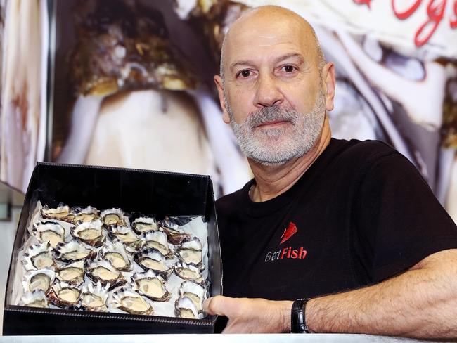 DAILY TELEGRAPH - Pictured at his GetFish Oyster Bar at the Sydney Royal Easter Show today is Frank Theodorou, whose Sydney Rock Oyster supply has been affected by the recent floods. Picture: Tim hunter.