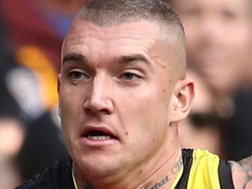 MELBOURNE, VICTORIA - MAY 06:  Dustin Martin of the Tigers beats the tackle of Nat Fyfe of the Dockers  during the 2018 AFL round seven match between the Richmond Tigers and the Fremantle Dockers at the Melbourne Cricket Ground on May 6, 2018 in Melbourne, Australia.  (Photo by Scott Barbour/AFL Media/Getty Images)