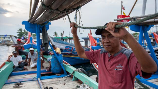 Local fisherman Yosep on his boat at the port at Pelabuhan Ratu, Java. His younger brother was jailed in Australia for people-smuggling. Picture: Graham Crouch