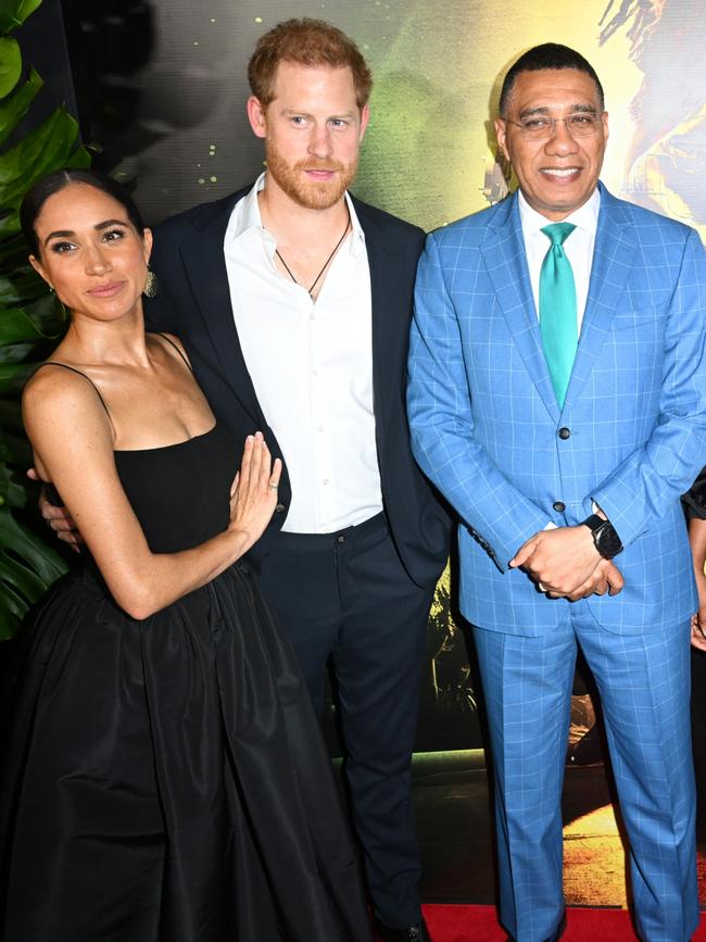 Meghan Markle and Prince Harry with anti-monarchist Andrew Holness during a visit to Jamaica. Picture: Getty Images