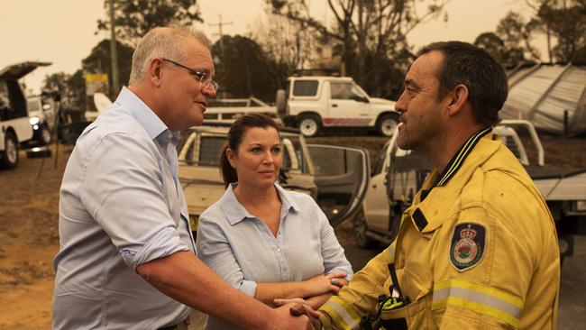 Prime Minister Scott Morrison and wife Jenny visited Cobargo, where they met Mark Ayliffe at the Cobargo RFS station, NSW on Thursday January 2, 2020. Picture: Sean Davey