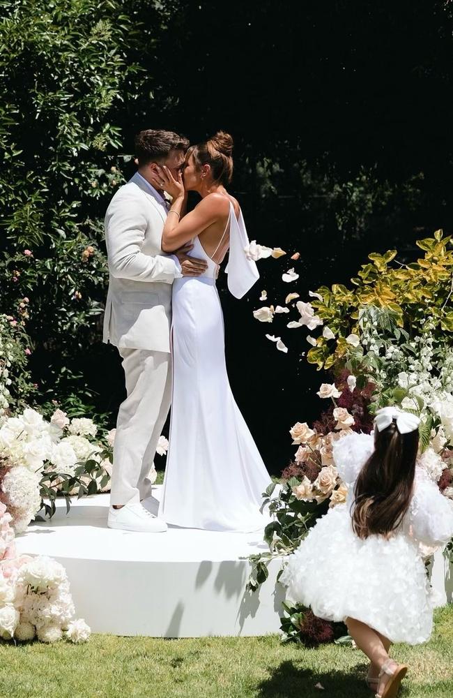 Kayla Itsines and Jae Woodroffe wed in a backyard celebration. Picture: Christina Toulantas