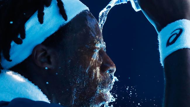 MELBOURNE, AUSTRALIA - JANUARY 18:  Gael Monfils of France attempts to cool down between games in his second round match against Novak Djokovic of Serbia on day four of the 2018 Australian Open at Melbourne Park on January 18, 2018 in Melbourne, Australia.  (Photo by Michael Dodge/Getty Images) *** BESTPIX ***