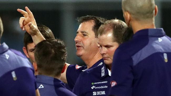 DARWIN, AUSTRALIA — JULY 09: Dockers coach Ross Lyon speaks to his players at the break during the round 16 AFL match between the Melbourne Demons and the Fremantle Dockers at TIO Stadium on July 9, 2016 in Darwin, Australia. (Photo by Robert Cianflone/Getty Images)