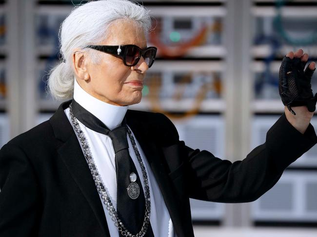 German fashion designer Karl Lagerfeld acknowledges the audience at the end of the Chanel 2017 Spring/Summer ready-to-wear collection fashion show. Picture: AFP 