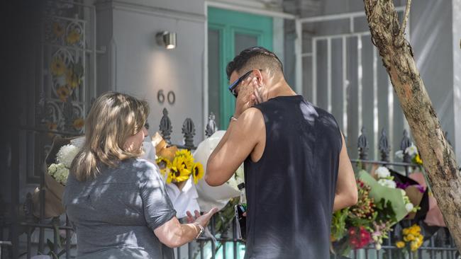 People leave tributed outside the Paddington home of Jesse Baird. Picture: NCA NewsWire / Monique Harmer