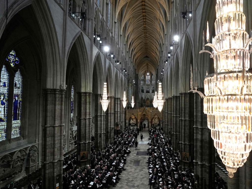 Guests and officials take their seats inside Westminster Abbey. Picture: AFP