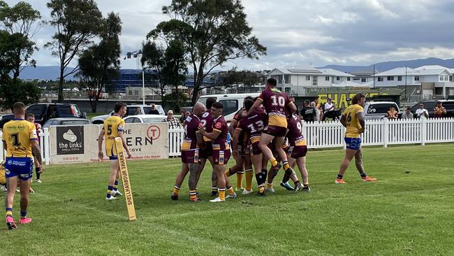 The Shellharbour Sharks celebrate a try from Joshua Starling. Photo: Kevin Merrigan