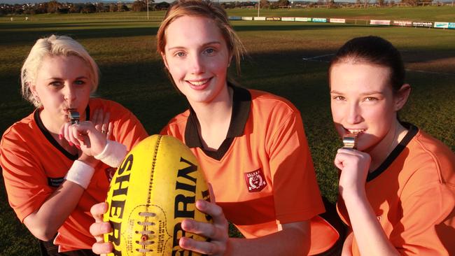 Megan Schutt (right) in her football umpiring days.