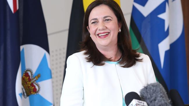 Queensland Premier Annastacia Palaszczuk celebrates victory yesterday (AAP Image/Jono Searle)