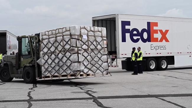 Infant formula from Germany being loaded into a FedEx truck for distribution after the US Air Force flight in May. Picture: AFP PHOTO / First lieutenant Emma Quirk / US Air Force