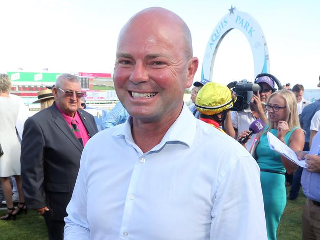 Gold Coast Turf Club race meeting, featuring two major lead in races to the Magic Millions.Photo of race 7. Photo of winner number 9 SNOW VALLEY. Jockey is Robbie Fradd, trainer is Matthew Dunn (pictured).Photo by Richard Gosling