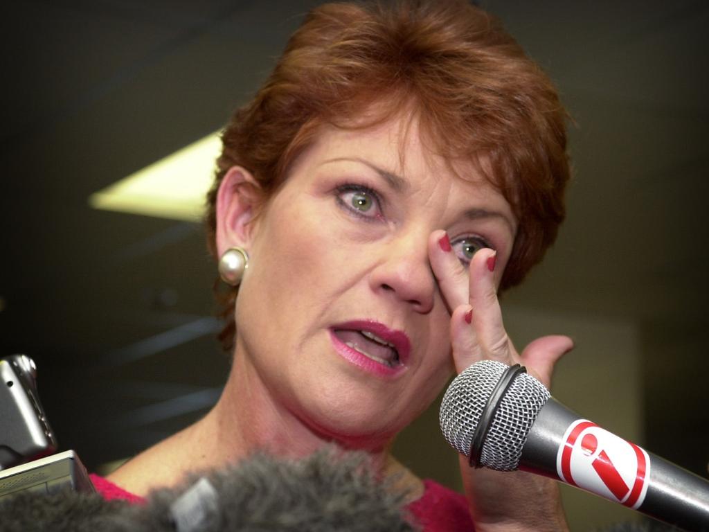 Hanson wipes away tears while speaking to the media at the ballot draw for the 2004 Federal Election.