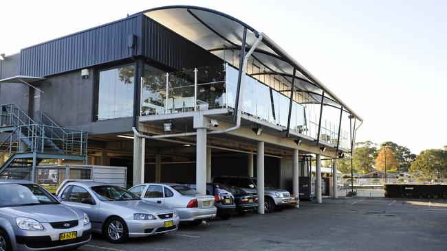 The neighbours went inside Gwandalan Bowling Club where they found the brother of the man who owned the car which ripped up their lawn. Picture: file