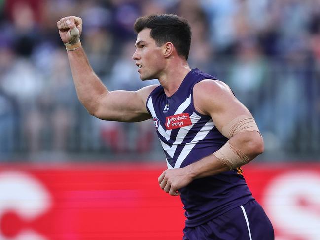 PERTH, AUSTRALIA - JUNE 23: Jaeger O'Meara of the Dockers celebrates after scoring a goal during the 2024 AFL Round 15 match between the Fremantle Dockers and the Gold Coast SUNS at Optus Stadium on June 23, 2024 in Perth, Australia. (Photo by Will Russell/AFL Photos via Getty Images)