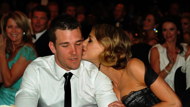 2011 Brownlow Medal. Winner Dane Swan kisses partner Taylor Wilson