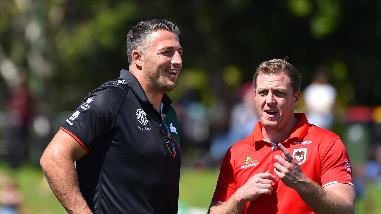 Sam Burgess and Ryan Carr speak before a match this season. Picture: Emily Barker/Getty Images.